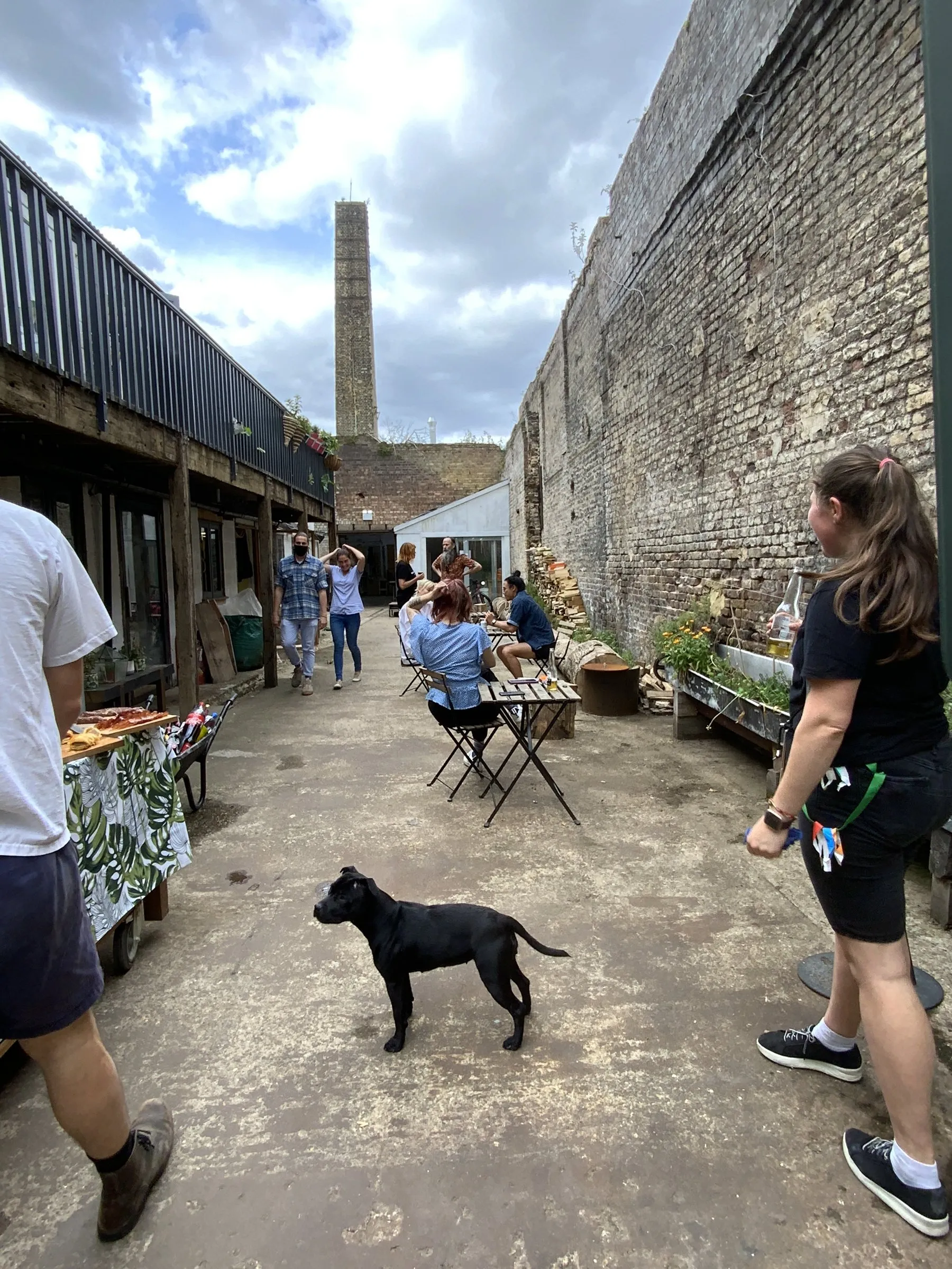 Members in the courtyard at Hone Limehouse