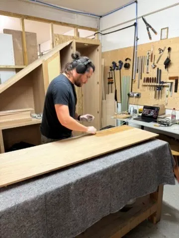Mark Stewart at a bench in the woodwork shop at Hone Bristol