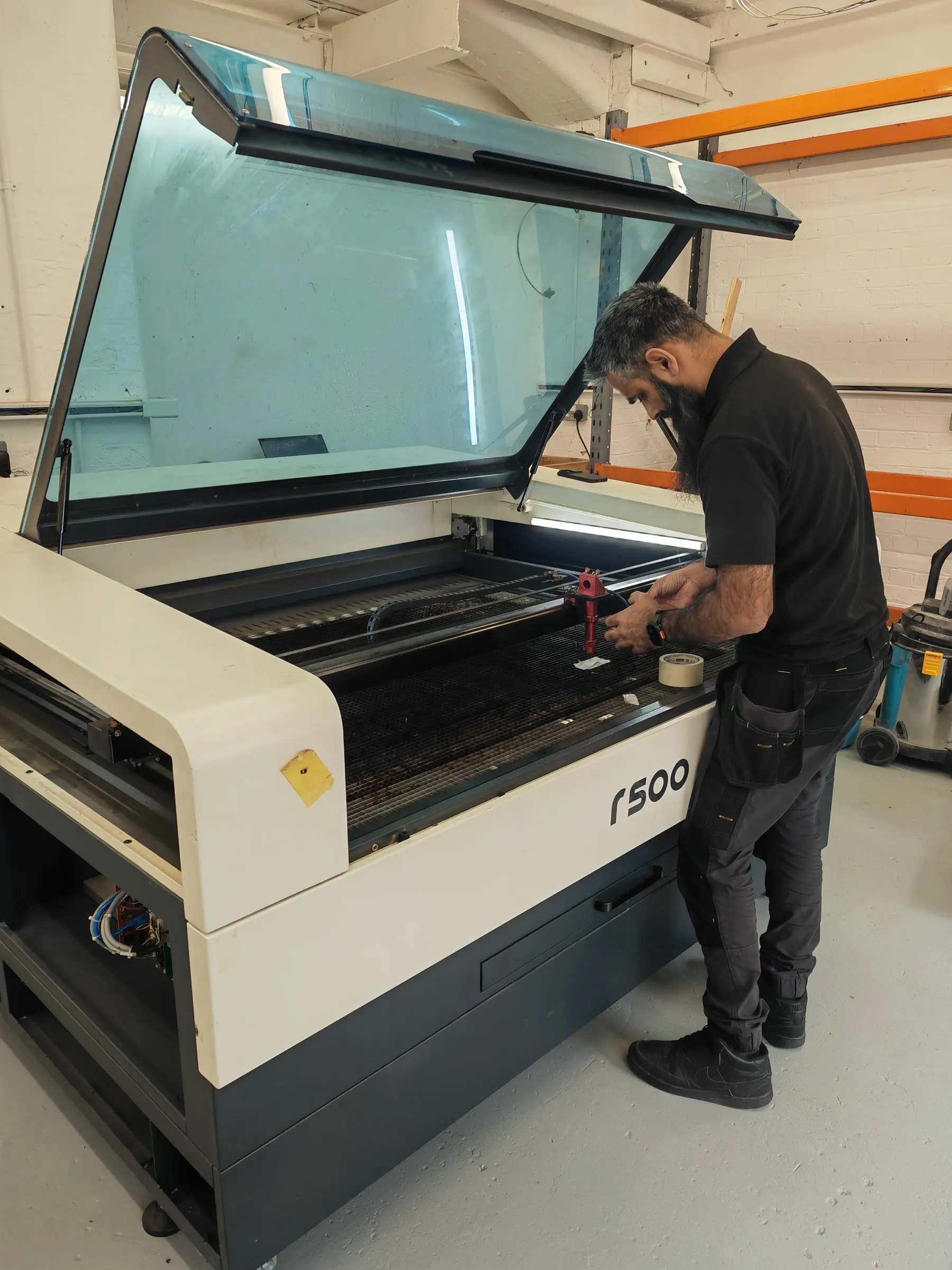 A member setting up a job on the Trotec Rayjet R500 laser