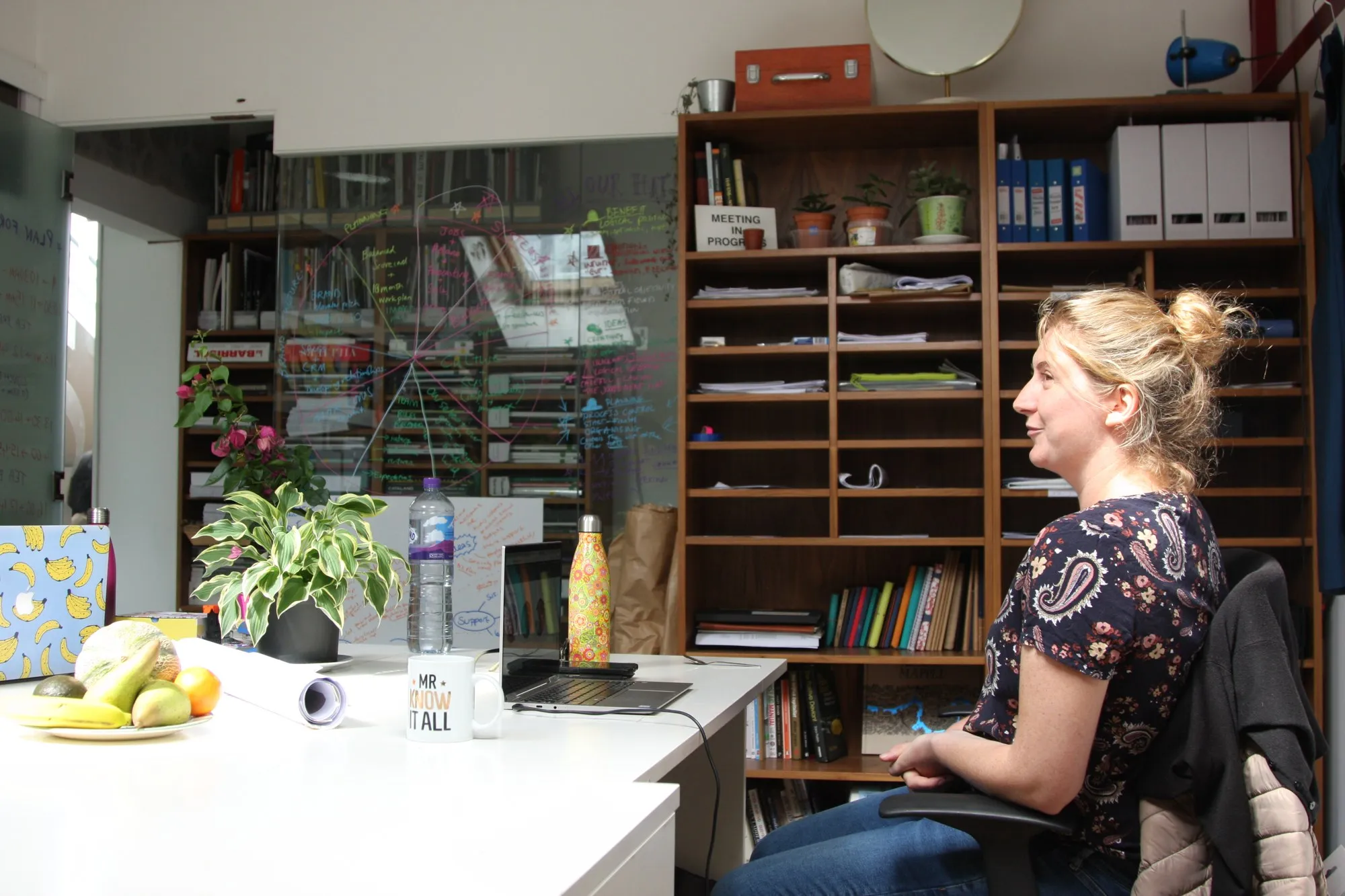 A designer at her desk in a studio at Hone Limehouse