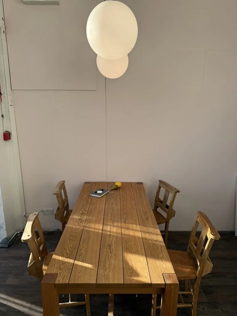 The long table in the shared kitchen at Hone Tottenham